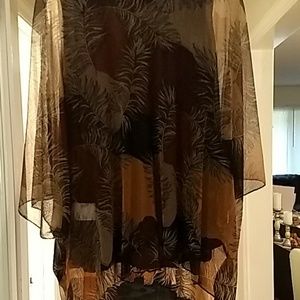 Beautiful multi colored top w black lining.